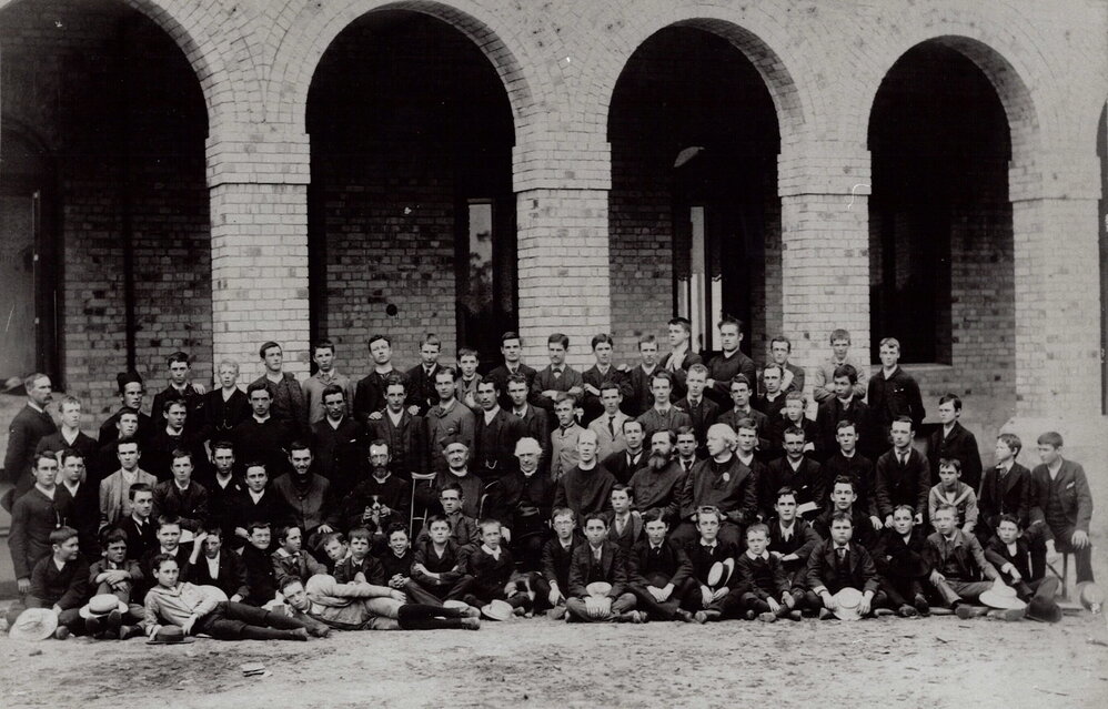 Jesuits, staff and students photographed outside the newly built Arrupe, 1889