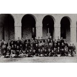 Jesuits, staff and students photographed outside the newly built Arrupe, 1889